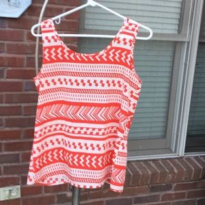 Cream and orange colored top